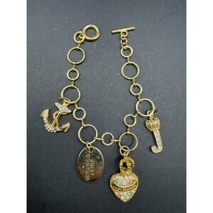 Juicy Couture Gold Tone Heart Crown Anchor Charm Statement Bracelet Toggle Clasp